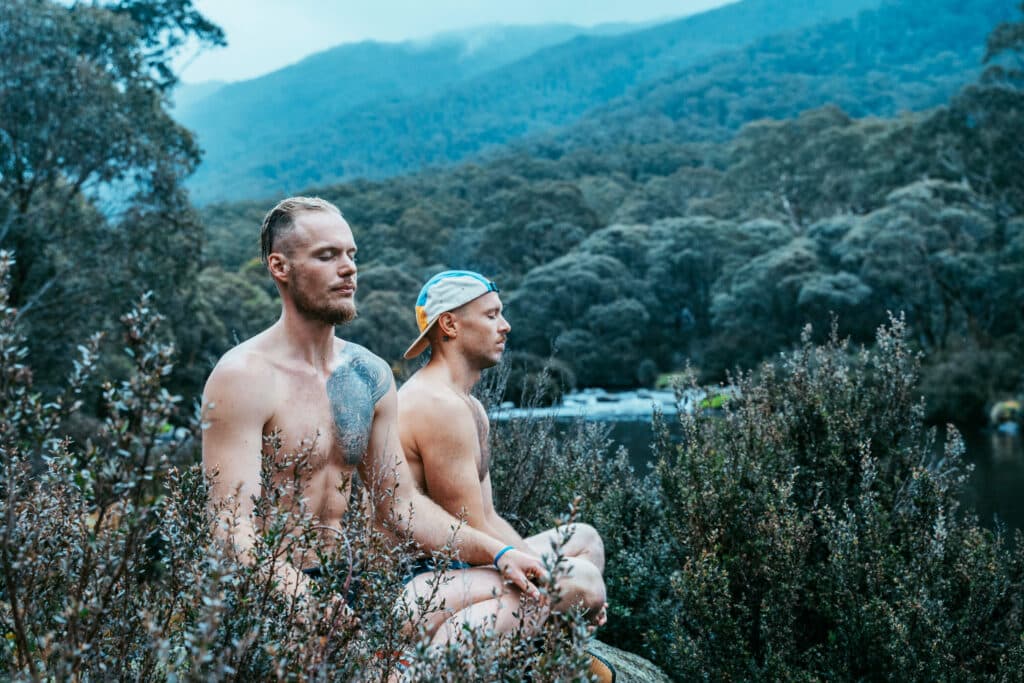 Johannes doing breathwork in the snowy mountains