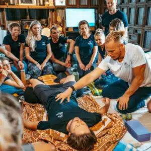 Johannes shows his soon to be breathwork instructors how to perform a breathwork technique